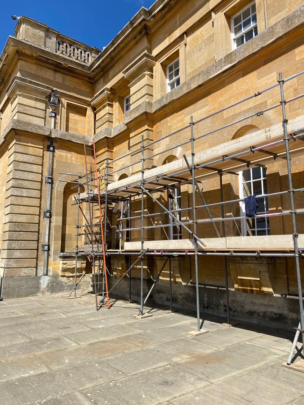 Scaffolding to Cotswold stone facade during exterior decoration works at Blenheim Palace by Brierty Decoration